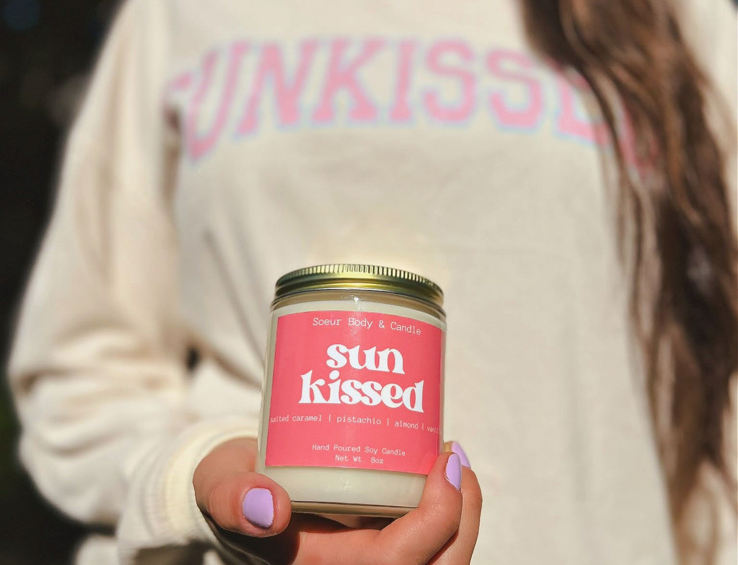 Holding Sun Kissed Soy Candle