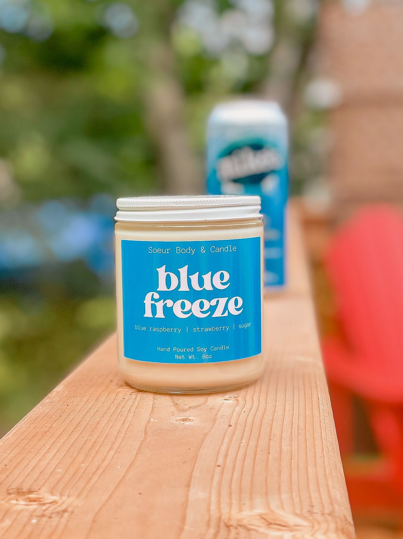 Blue Freeze Soy Wax Candle with scents of blue raspberry, strawberry, and sugar that lasts up to 45 hours! Cruelty-free, vegan, handmade, paraben and phthalate free, and sustainably packaged.