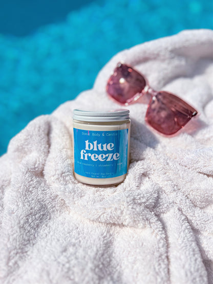 Blue Freeze Soy Wax Candle with scents of blue raspberry, strawberry, and sugar that lasts up to 45 hours! Cruelty-free, vegan, handmade, paraben and phthalate free, and sustainably packaged.