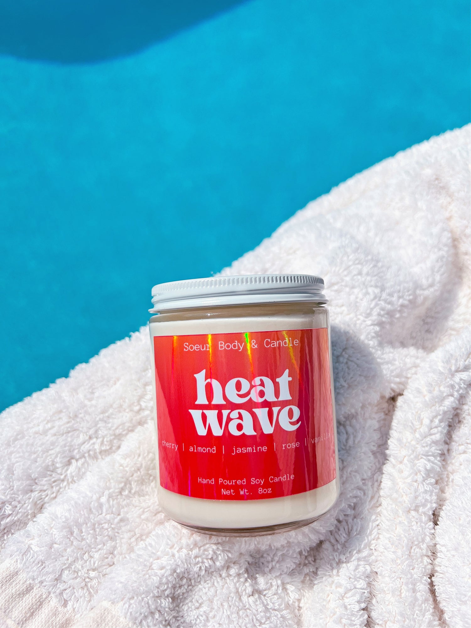 Heat Wave Soy Wax Candle with scents of cherry, almond, jasmine, rose, and vanilla (a dupe of the popular Lost Cherry scent by Tom Ford) that lasts up to 45 hours! This candle is cruelty-free, vegan, handmade, paraben and phthalate free, and sustainably packaged.