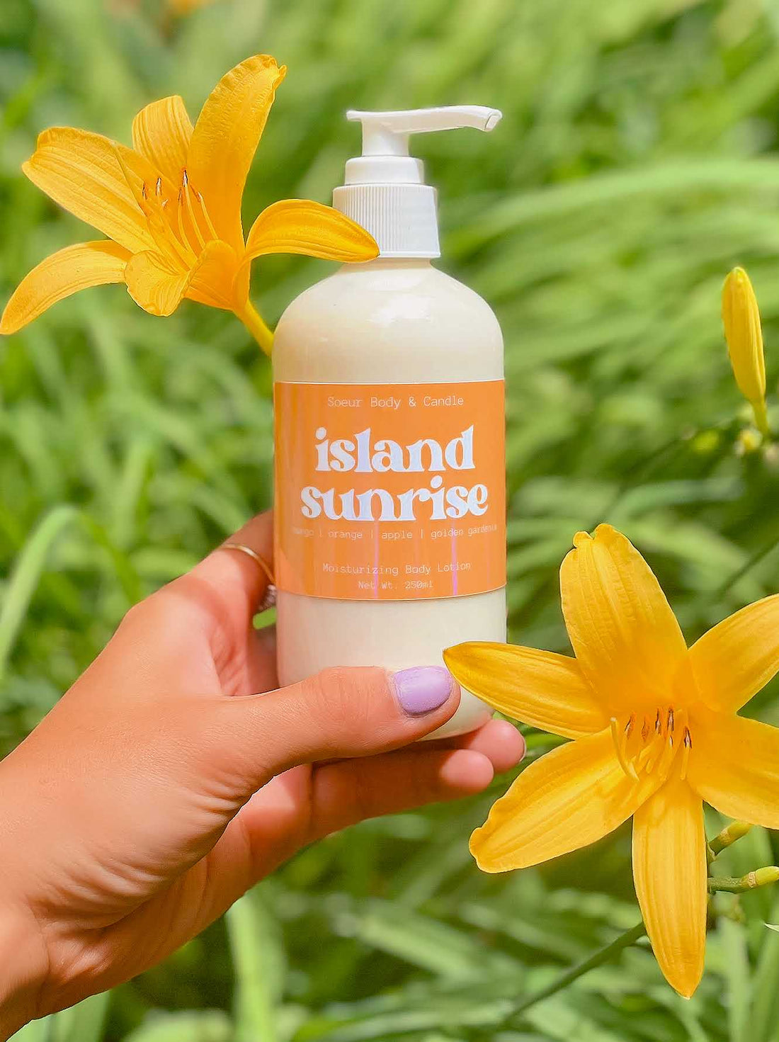 Island Sunrise Body Lotion featuring hemp oil for moisturizing with a mango, orange, apple, and golden gardenia scent. Cruelty-free, vegan, and sustainably packaged.