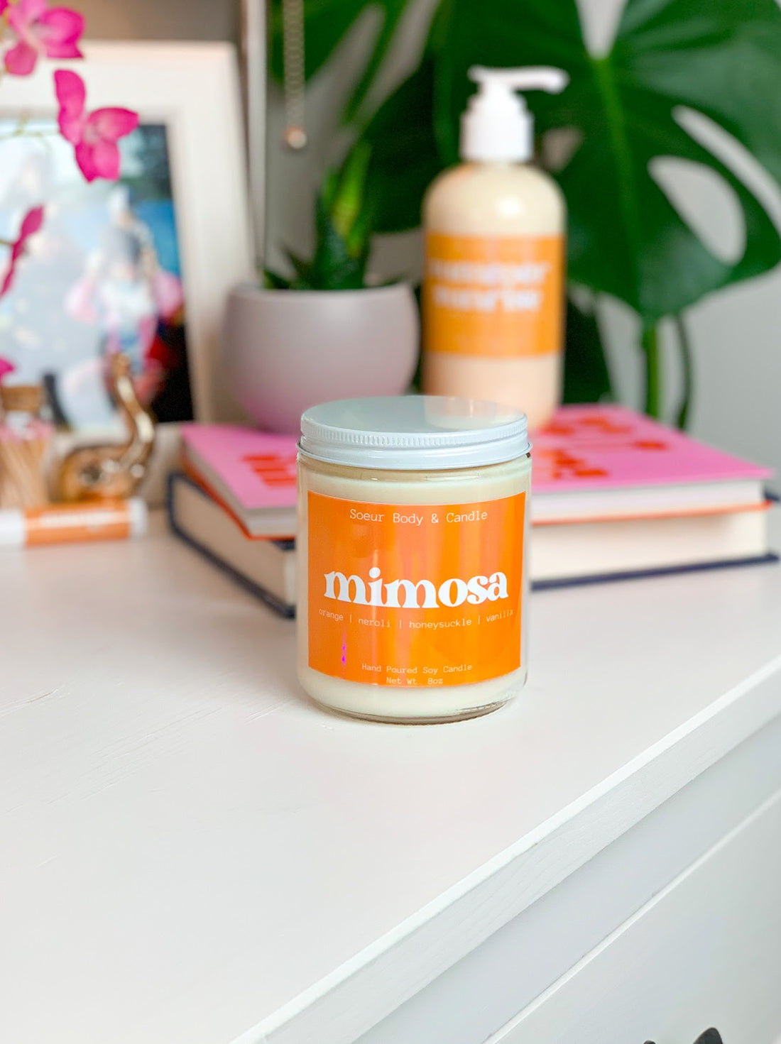 Mimosa Soy Wax Candle with scents of orange, neroli, honeysuckle, and vanilla that lasts up to 45 hours! This candle is cruelty-free, vegan, handmade, paraben and phthalate free, and sustainably packaged.