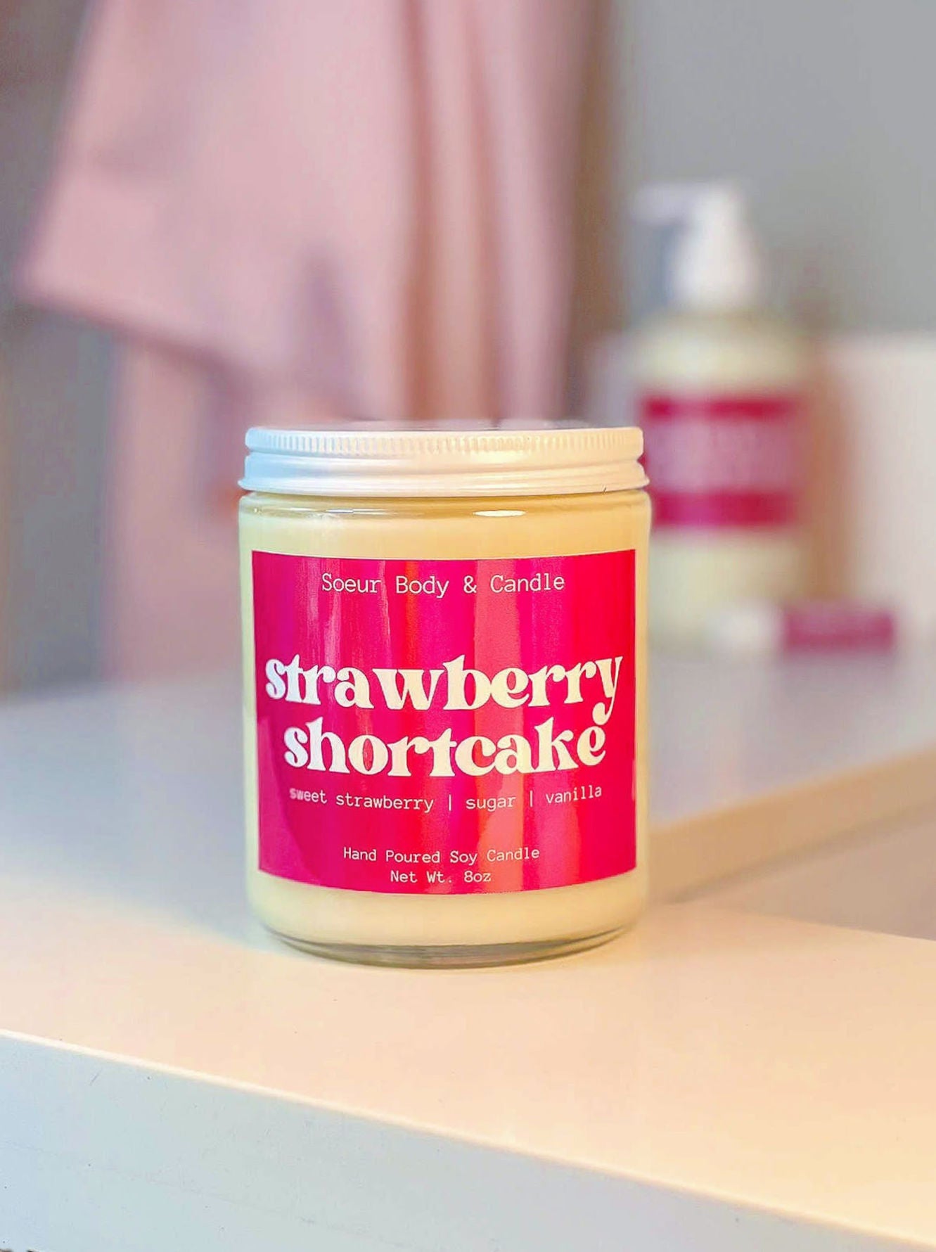 Strawberry Shortcake Soy Wax Candle with scents of sweet strawberry, sugar, and vanilla that lasts up to 45 hours! This candle is cruelty-free, vegan, handmade, paraben and phthalate free, and sustainably packaged.