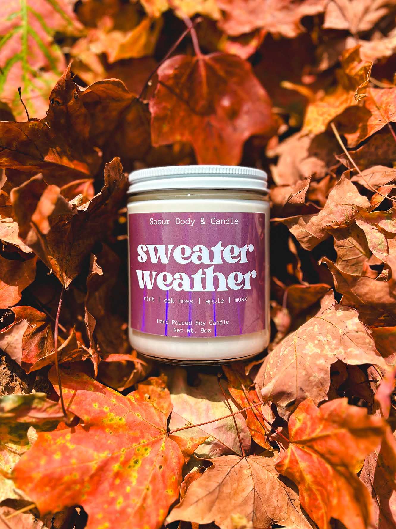 Sweater Weather Soy Wax Candle with scents of mint, oak moss, apple, and musk that lasts up to 45 hours! Cruelty-free, vegan, handmade, paraben and phthalate free, and sustainably packaged.