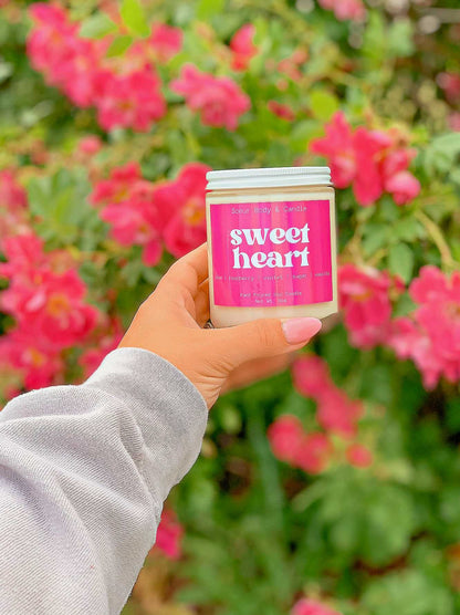 Sweet Heart Soy Wax Candle with scents of plum, raspberry, violet, sugar, and vanilla that lasts up to 45 hours! This candle is cruelty-free, vegan, handmade, paraben and phthalate free, and sustainably packaged.