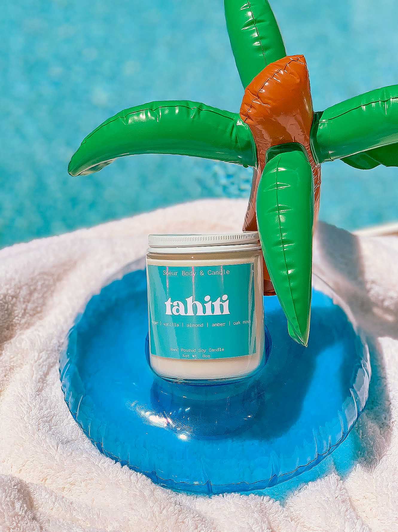 Tahiti Soy Wax Candle with scents of sugar, vanilla, almond, amber, and oak moss that lasts up to 45 hours! This candle is cruelty-free, vegan, handmade, paraben and phthalate free, and sustainably packaged.